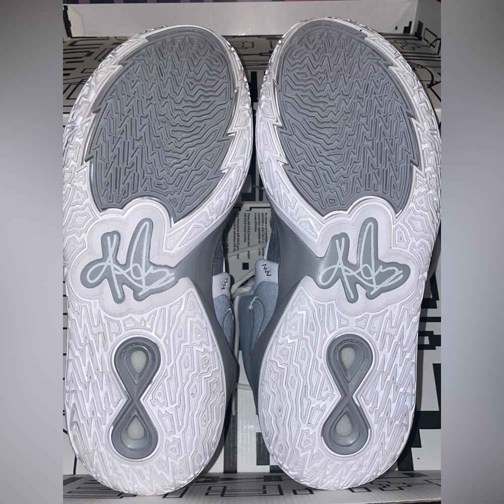 Grey and White Kyrie 6s